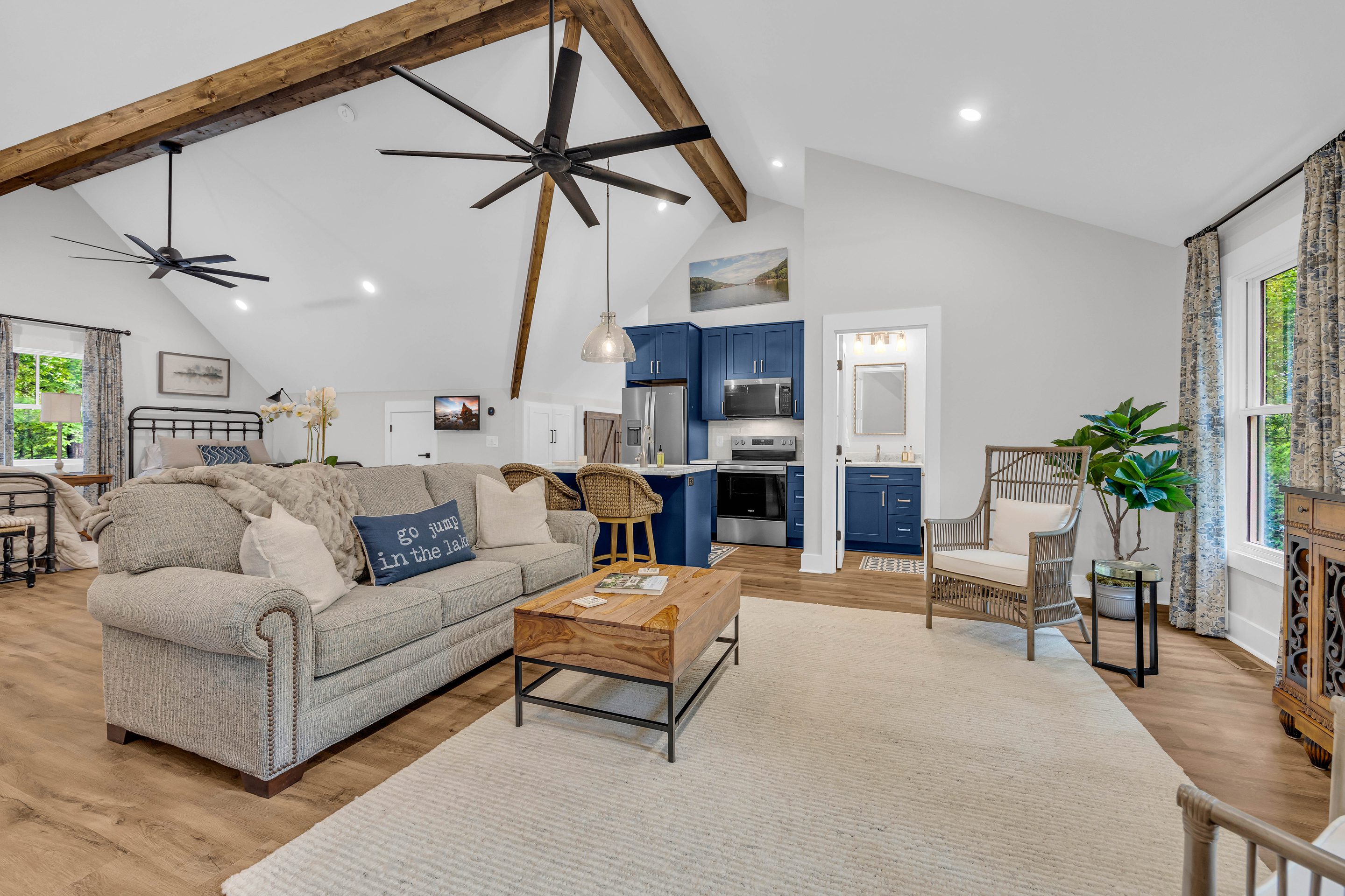 A living room with a couch and chair in it