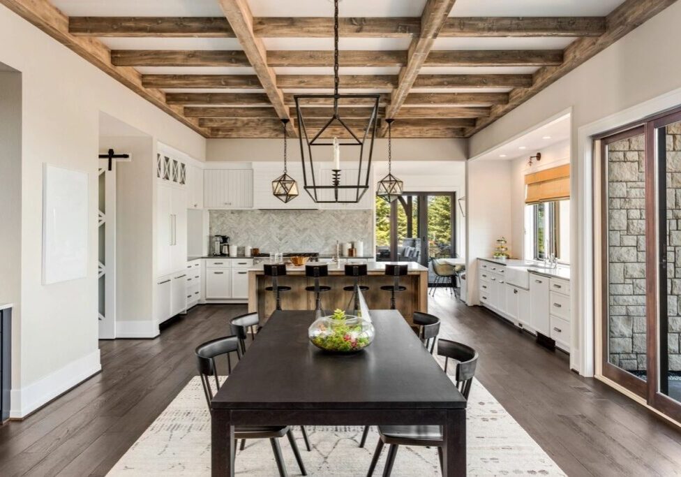 fm=f_Qzl9x4Q A large kitchen with a dining table and chairs.